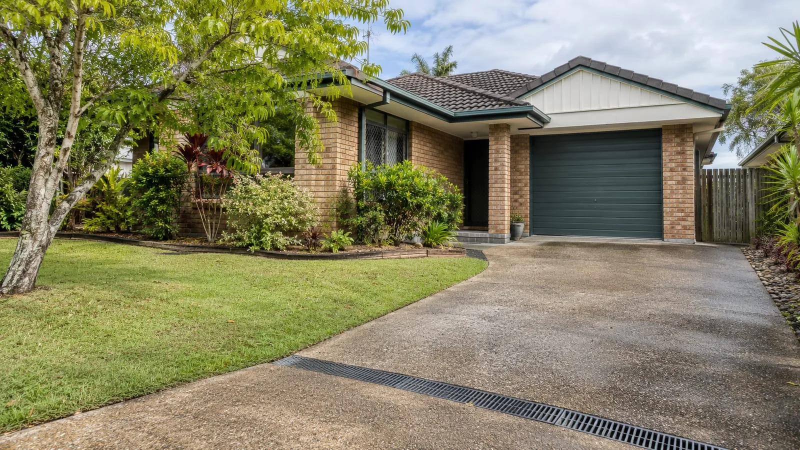 AI-generated illustration: Chermside established brick residence with garden and tidy driveway stormwater drain